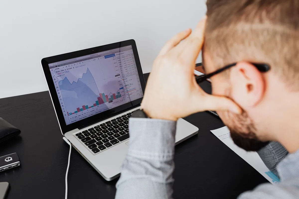 A solo founder reviewing a blank analytics dashboard — no sales, no signal